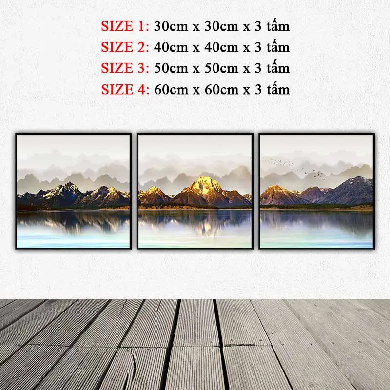 Tranh ngọn núi với ánh sáng vàng in bóng xuống mặt hồ phẳng lặng