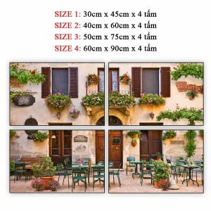 Tranh In Canvas Quán Cà Phê Góc Phố Châu Âu Ngập Tràn Hoa Lãng Mạn