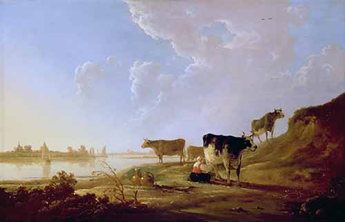 Cảnh sông nước với người phụ nữ đang vắt sữa bò